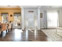 Bright foyer featuring soaring ceilings, a decorative rug, and hardwood floors that provide a warm welcome at 35 Dorie Dr, Belmont, NC 28012