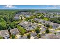 Beautiful aerial view of the neighborhood showcasing lush greenery, well-maintained homes and verdant trees at 417 Brier Knob Dr, Fort Mill, SC 29715