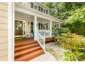 Inviting front porch featuring ample seating, lovely decor, and a warm, welcoming ambiance at 4333 Poplar Grove Dr, Charlotte, NC 28269