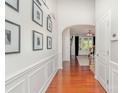 Bright foyer featuring gleaming hardwood floors, white trim, and neutral paint at 2548 Chasewater Dr, Fort Mill, SC 29707