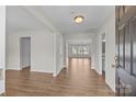 Inviting entryway with neutral walls and wood-look flooring at 423 Courtland Ct, Kannapolis, NC 28081