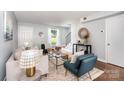 Comfortable living area with hardwood floors, stylish seating, and natural light at 4329 Hathaway St # D, Charlotte, NC 28211