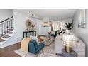 Bright and airy living room featuring hardwood floors, stylish decor, and comfortable seating at 4329 Hathaway St # D, Charlotte, NC 28211