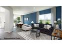 Bright living room featuring modern furnishings, a large window, and an adjacent dining area at 545 Trading Post Ln, York, SC 29745