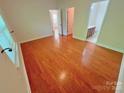 Bedroom featuring hardwood floors, neutral paint and ample natural light at 11624 Truan Ln, Cornelius, NC 28031