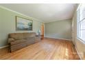 Inviting living room boasting a large window and comfortable furnishings at 5840 Potter Rd, Matthews, NC 28104