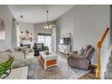 Bright and airy living room featuring a fireplace, neutral decor, and seamless access to the outdoors at 841 Lacebark Dr, Rock Hill, SC 29732