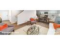 Cozy living room with fireplace, open floor plan, and ample seating arrangements at 1035 20Th Avenue Se Loop, Hickory, NC 28602