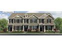 Attractive townhome exterior with mixed siding, black shutters, covered porch, and tidy landscaping at 2024 Harlequin Dr, Indian Trail, NC 28079