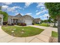 Street view of homes with well-manicured lawns, driveways, and inviting curb appeal at 5141 Grandview Dr, Fort Mill, SC 29707