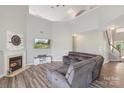 Spacious living room featuring a fireplace and tall ceilings at 9008 Magna Ln, Indian Trail, NC 28079