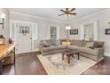 Inviting living room showcases hardwood floors, comfortable seating, and abundant natural light at 215 S Shaver St, Salisbury, NC 28144