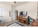 Charming bedroom featuring a piano, neutral walls, and soft carpet at 163 Carmen Way, Lancaster, SC 29720