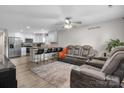 Inviting living room with an open floorplan, modern furniture, and seamless flow into the well-equipped kitchen at 2411 28Th Ne St, Hickory, NC 28601