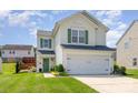 Charming two-story home featuring a well-maintained lawn, green shutters, and a two-car garage at 2636 Forest Grove Ct, Charlotte, NC 28269