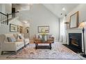 Spacious living area with fireplace, high ceilings and elegant decor at 3912 Grace Ct, Indian Trail, NC 28079