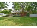 Charming home with a covered front porch and well-maintained landscaping, offering great curb appeal at 109 Larch Rd, Salisbury, NC 28147