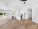 Spacious open-concept kitchen and living room area with vaulted ceilings and natural light at 2104 County Line Rd, Kings Mountain, NC 28086