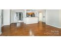 Inviting living space flows effortlessly into the kitchen, offering a versatile layout and access to the outdoor patio at 2512 Cranbrook Ln # 9, Charlotte, NC 28207