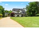 Beautiful two-story home with large yard, long driveway, perfect for families at 106 Kent Ct, Mooresville, NC 28117