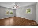 Bright bedroom featuring neutral walls, hardwood flooring, and a ceiling fan at 1810 Country Manor Ln # 34, Rock Hill, SC 29730