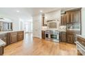 Gourmet kitchen featuring stainless steel appliances, wood cabinets, and a spacious layout at 9202 Arlington Hills Dr, Mint Hill, NC 28227