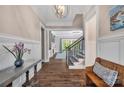 Inviting foyer featuring hardwood floors, a bench, and views of the living space at 1622 Hunters Place Rd, York, SC 29745