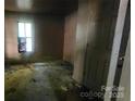 Bright bedroom features natural light through the window, creating a cozy atmosphere at 210 Mahan Sw St, Concord, NC 28025