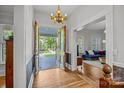 Inviting foyer with hardwood floors leading to a bright living space at 217 S Ellis St, Salisbury, NC 28144