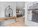 Inviting foyer with stylish decor leading into an open-concept kitchen and living area at 3822 Topsfield Rd, Charlotte, NC 28211