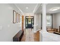 Bright and spacious foyer featuring elegant columns, hardwood floors, and stylish decor at 1478 Imperial Ct, York, SC 29745