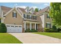 Attractive home with a two-car garage and a concrete driveway at 1805 Sutter Creek Dr, Waxhaw, NC 28173