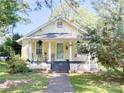 Inviting single-story home with a classic front porch and well-maintained landscaping at 436 8Th Avenue Nw Dr, Hickory, NC 28601