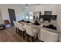 Modern kitchen island with seating, stainless steel appliances, and sleek countertops at 6386 Cathedral Dr, Granite Falls, NC 28601