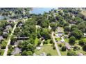 Aerial view showcases the neighborhood, lake access, and property location at 7869 Cherry Point at 7869 Cherry Point Dr, Denver, NC 28037