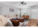 Bright and spacious living room with a large sectional sofa, hardwood floors, and ample natural light at 1067 33Rd Avenue Ne Loop, Hickory, NC 28601