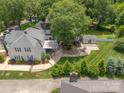 Aerial view showcasing the home's backyard with patio, lush greenery, and outdoor space at 420 S Cedar St, Lincolnton, NC 28092