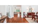 Elegant entryway featuring hardwood floors and an open view into the living spaces at 5424 Morris Hunt Dr, Fort Mill, SC 29708
