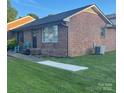 Charming brick home featuring a well-manicured lawn and welcoming entrance for a desirable curb appeal at 441 Willow Spring Ln, Rock Hill, SC 29730