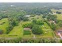 Sprawling wooded property with well-maintained home, outbuildings and private pond at 1081 Long Dr, Newton, NC 28658