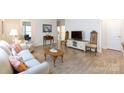 Bright and airy living room with hardwood floors at 238 Cherrytree Dr, Fort Mill, SC 29715