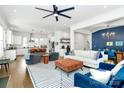 Bright open-concept living room connecting seamlessly to kitchen and dining area for modern living and easy entertaining at 2600 Palm Ave, Charlotte, NC 28205
