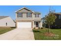 Two-story home featuring a two-car garage, neutral siding, and a well-maintained lawn in a suburban neighborhood at 2641 Goose Fair Rd # 88, Maiden, NC 28650