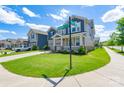 Attractive two-story home with a well-kept lawn on a corner lot in a residential neighborhood at 1004 Earlston Rd, Indian Trail, NC 28079
