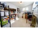 Functional pantry featuring open shelving and ample storage space, perfect for organization at 105 Venus Ave, Gastonia, NC 28052