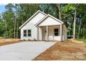 Charming single-story home with white siding and a cozy front porch at 217 E Division Ave, Salisbury, NC 28144