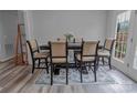 Elegant dining room with seating for six, stylish rug, and natural light at 532 Jedburgh Way, Rock Hill, SC 29730