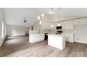 Bright kitchen featuring white cabinetry, an island, and stainless steel appliances at 737 Lynville Ln, Rock Hill, SC 29730