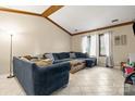 Spacious living room featuring tile floors, large windows, and vaulted ceilings at 8007 Red Lantern Rd, Indian Trail, NC 28079