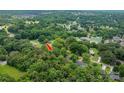 Panoramic aerial shot showcasing the property's location surrounded by mature trees in a peaceful neighborhood at 3120 7Th Street Ne Dr, Hickory, NC 28601